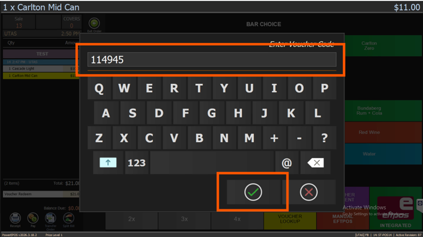 The on-screen keyboard with a gift card number entered